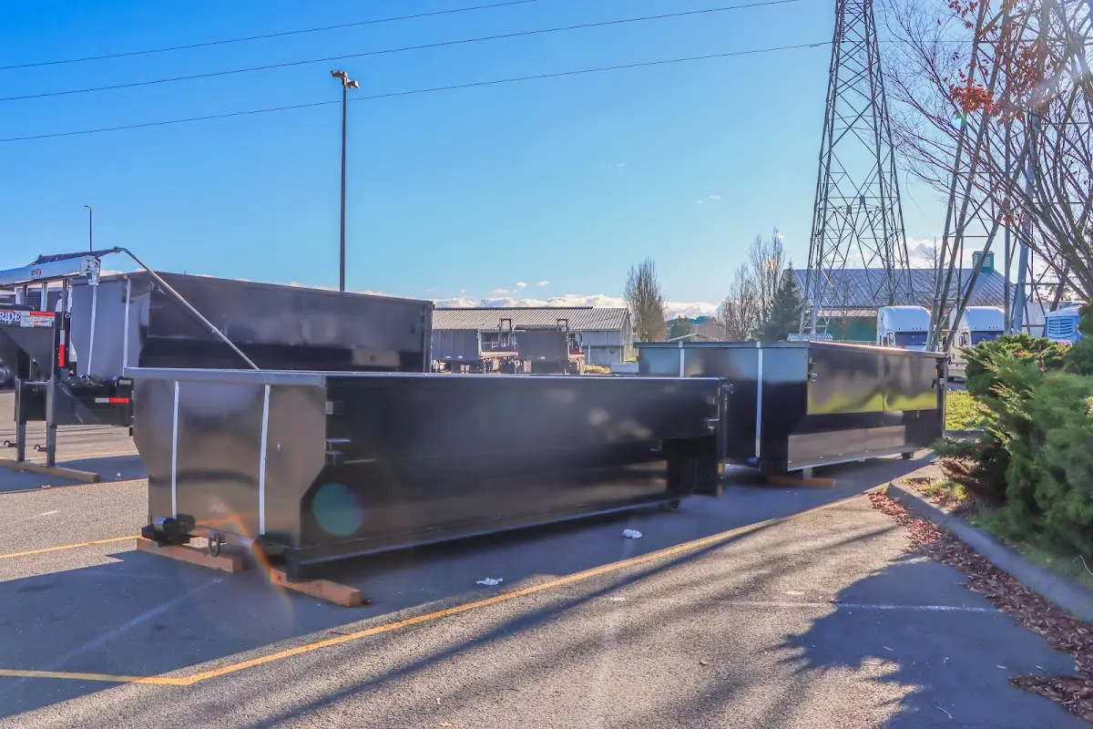 Roll-off dumpster ready for waste disposal at job site for 3 Yard Dumpster Rental in Foxborough